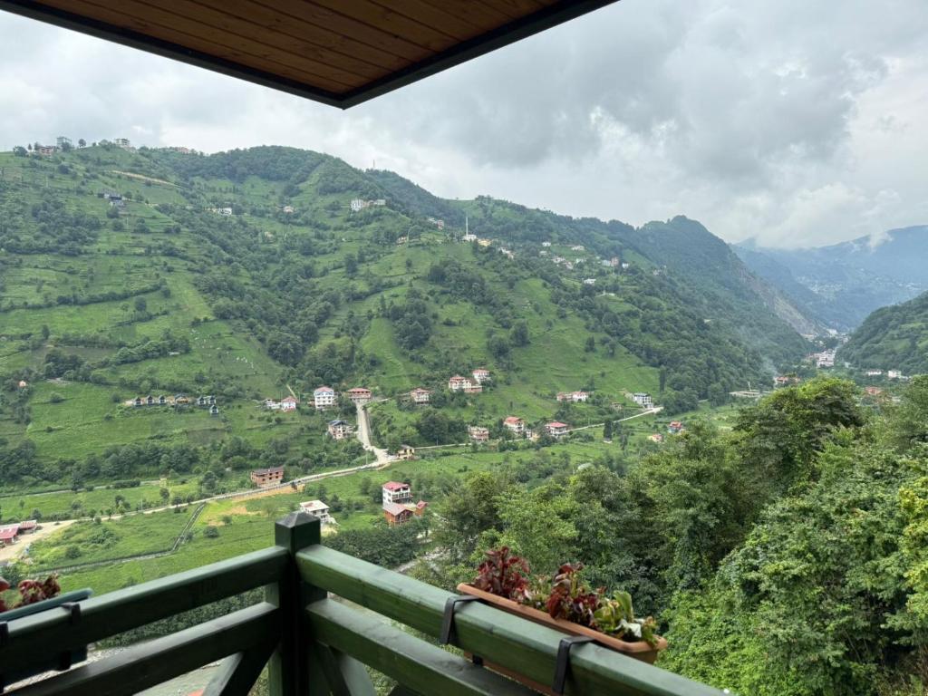 a view from a balcony of a mountain at بيوت رفال Refal Homes in Ardeşen