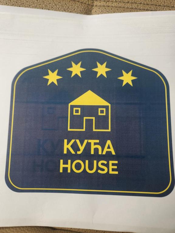a sign for a kyi house with stars on it at Prenociste T-07 in Smederevo