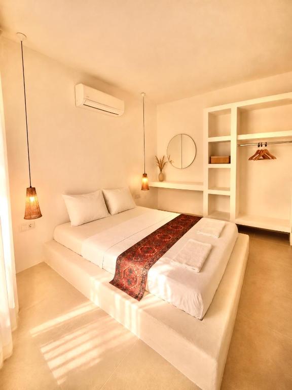a bedroom with two beds in a room at Gammi Hayıtbükü in Datca