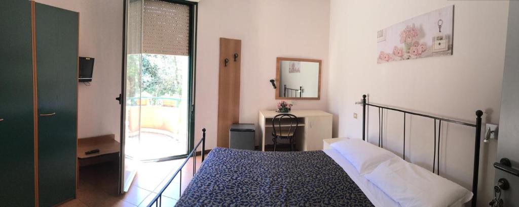 Postel nebo postele na pokoji v ubytování Hotel Stazione