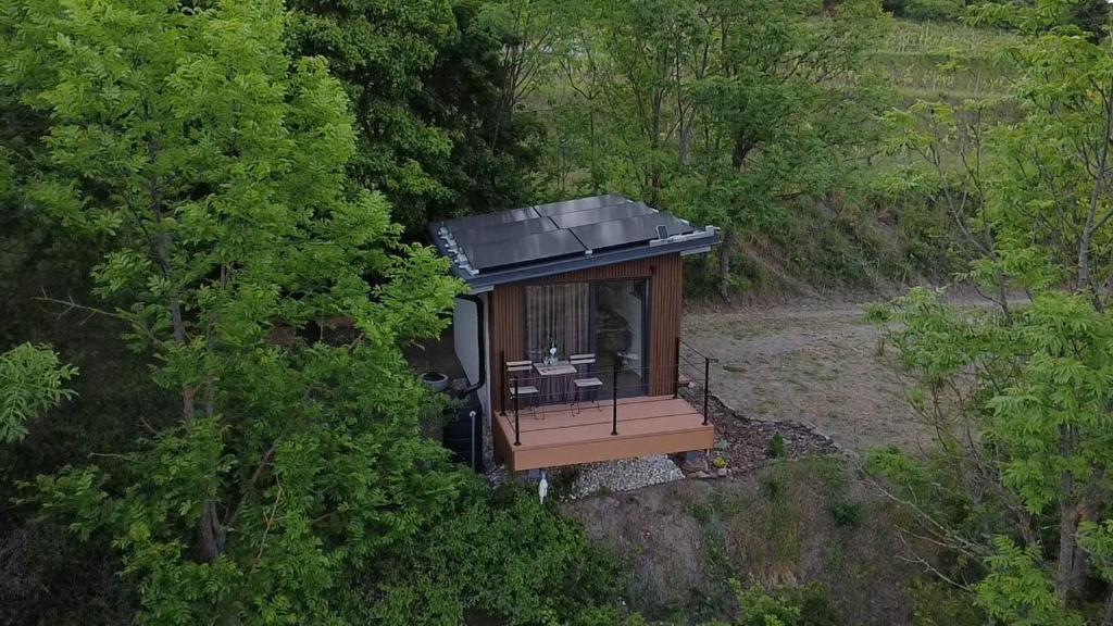 an aerial view of a tiny house in the woods at Posed pod hviezdami in Modra