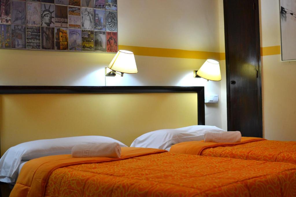 A bed or beds in a room at Nuevo Suizo