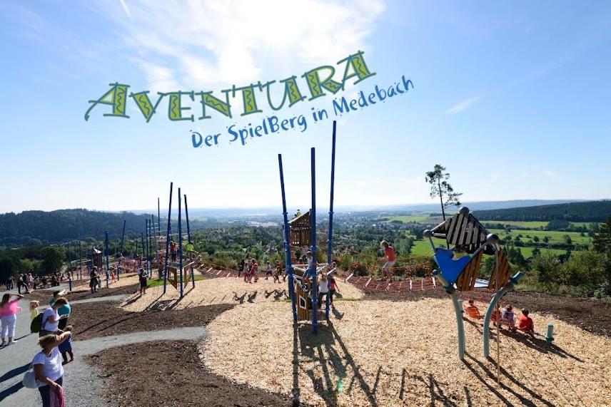 a group of people playing on a playground at Vor den Toren zum Adventure Spielberg Am Rothaarsteig in Medebach