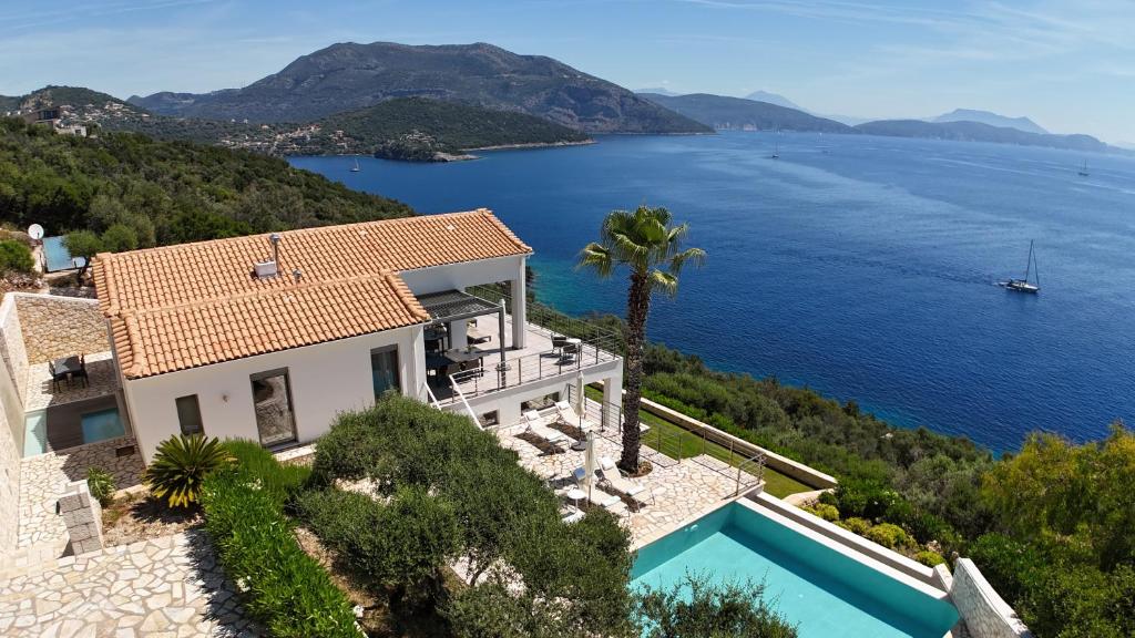 an image of a house with a view of the water at Villa Lefkas - Luxury villa Sivota with direct sea access in Sivota