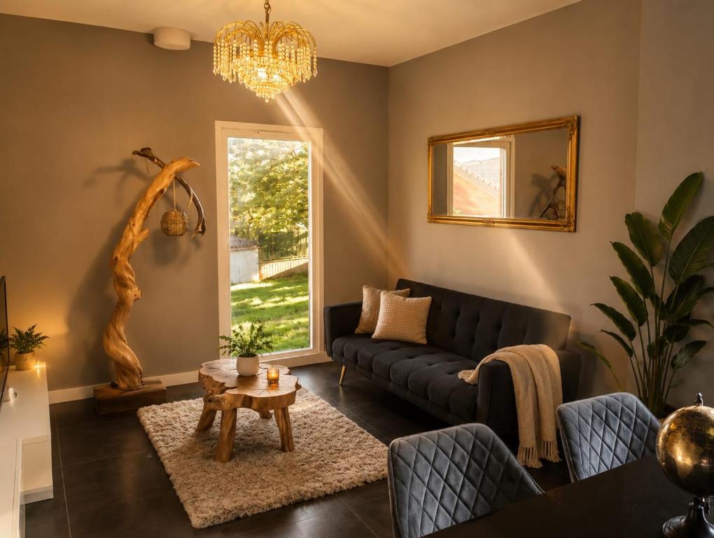 a living room with a couch and a table at Casa de campo en alava in Ollávarre