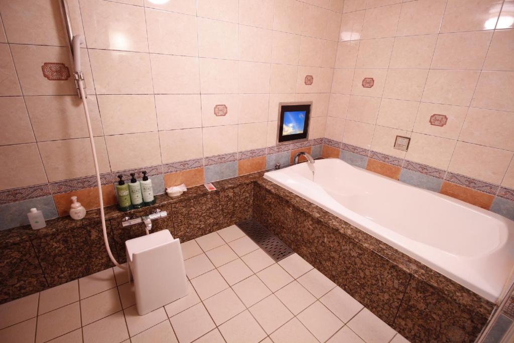 Koupelna v ubytování HOTEL ATLAS Shinkabukicho (Adult Only)
