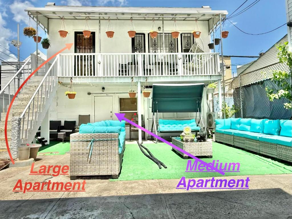 a house with a green lawn in front of it at 2265 Bruckner Blvd Apartments in Bronx