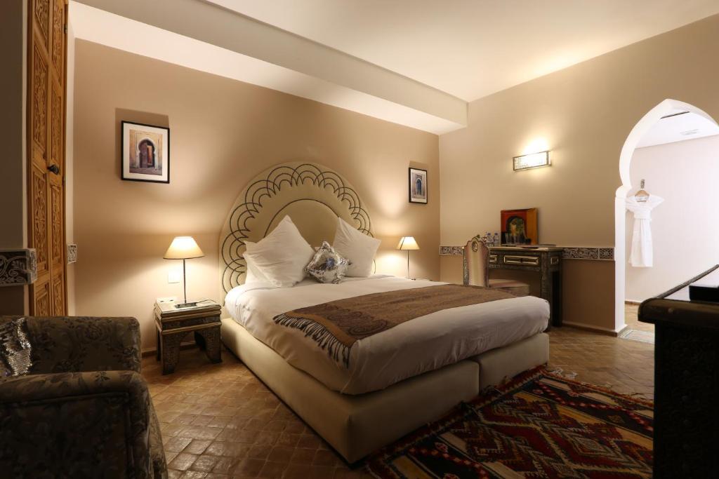 Postel nebo postele na pokoji v ubytování Riad Enchanté