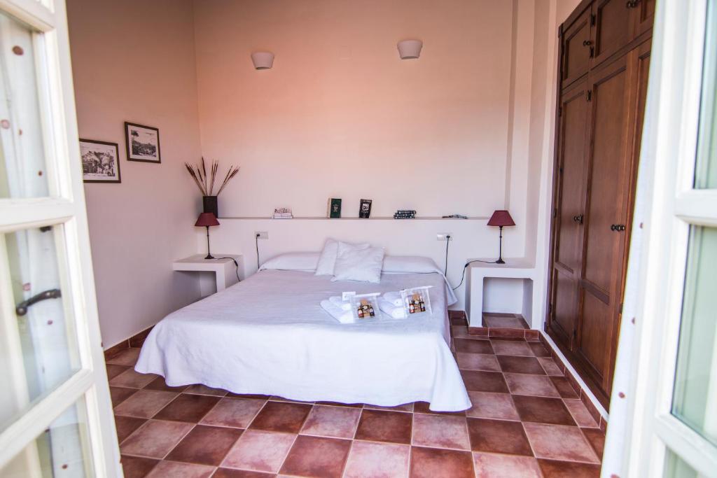 Postel nebo postele na pokoji v ubytování La Casa de Las Titas