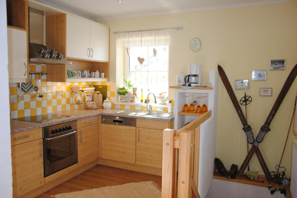 Kuchyň nebo kuchyňský kout v ubytování Ferienhaus Niedernsill