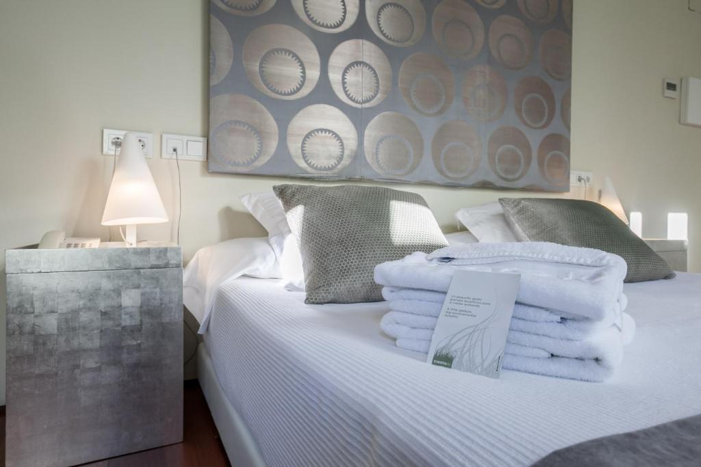 Posteľ alebo postele v izbe v ubytovaní Hotel Viento10