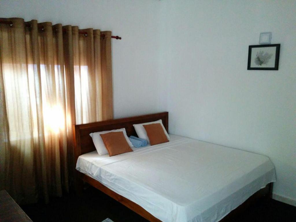Postel nebo postele na pokoji v ubytování Villa Two Residence