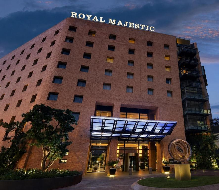 a building with a sign on top of it at Royal Majestic Hotel in Johannesburg