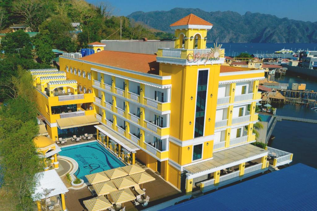 an aerial view of a hotel with a pool at Sunlight Hotel Coron in Coron