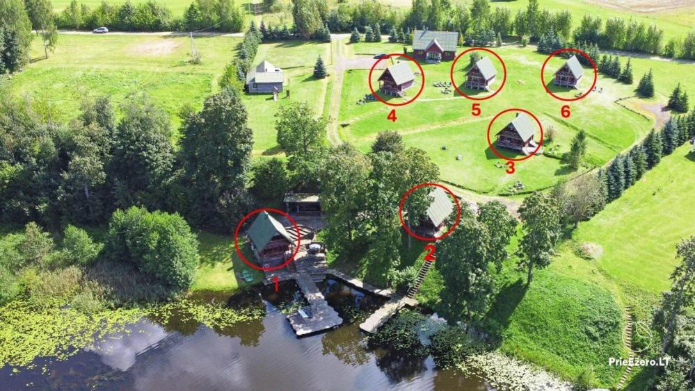an aerial view of a park with a group of tents at Ežero Panorama in Skirlėnai