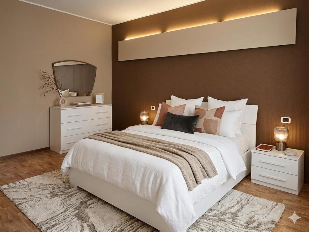 a bedroom with a large white bed and a mirror at Casa Sinetta Como Lake in Acquaseria
