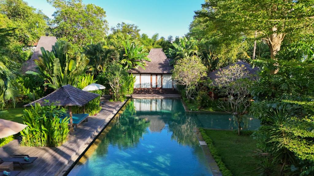 an image of a villa with a swimming pool at Kropak Canggu in Canggu