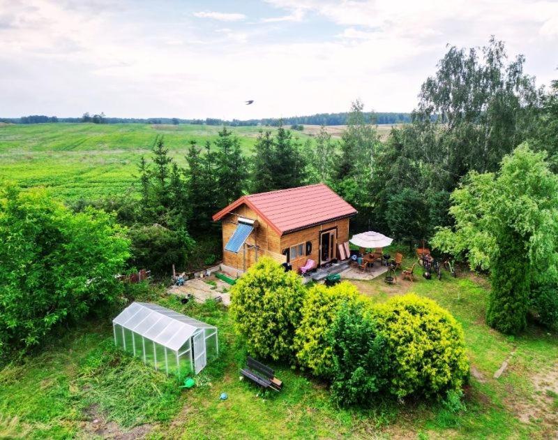 an overhead view of a small house in a field at Domcio Paluch in Wejdyki