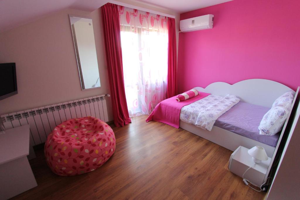 Postel nebo postele na pokoji v ubytování Guest House Arima