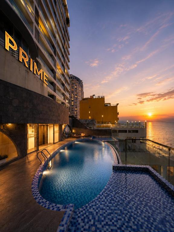 a swimming pool on the roof of a building at Prime New Hotel in Nha Trang