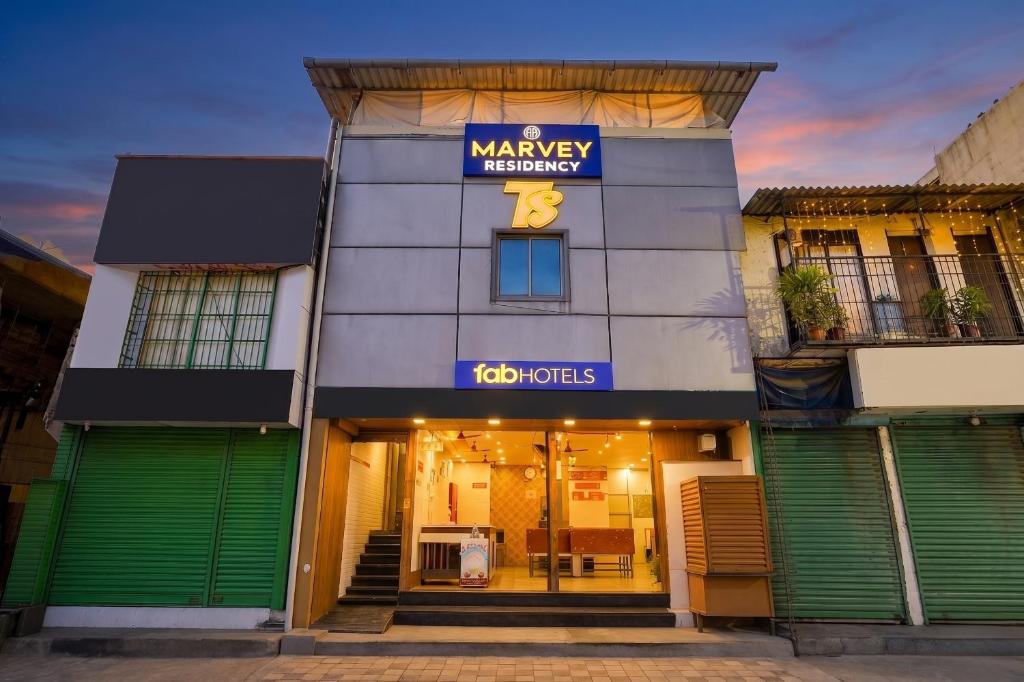 a building with a sign that reads a makeup retailer at FabHotel Marvey Residency in Mumbai