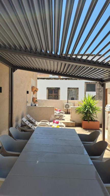 a large table and chairs in a living room at Mi Casa 4 in Jávea