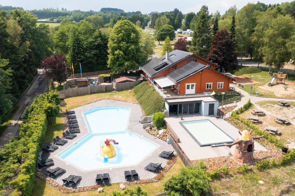 an aerial view of a house with a swimming pool at Arden Parks Petite Suisse in Dochamps
