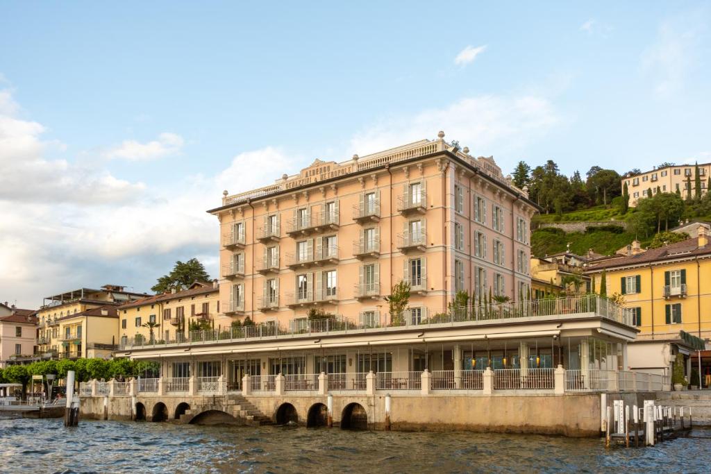 a building on a bridge over a river at Palazzo Genazzini in Bellagio