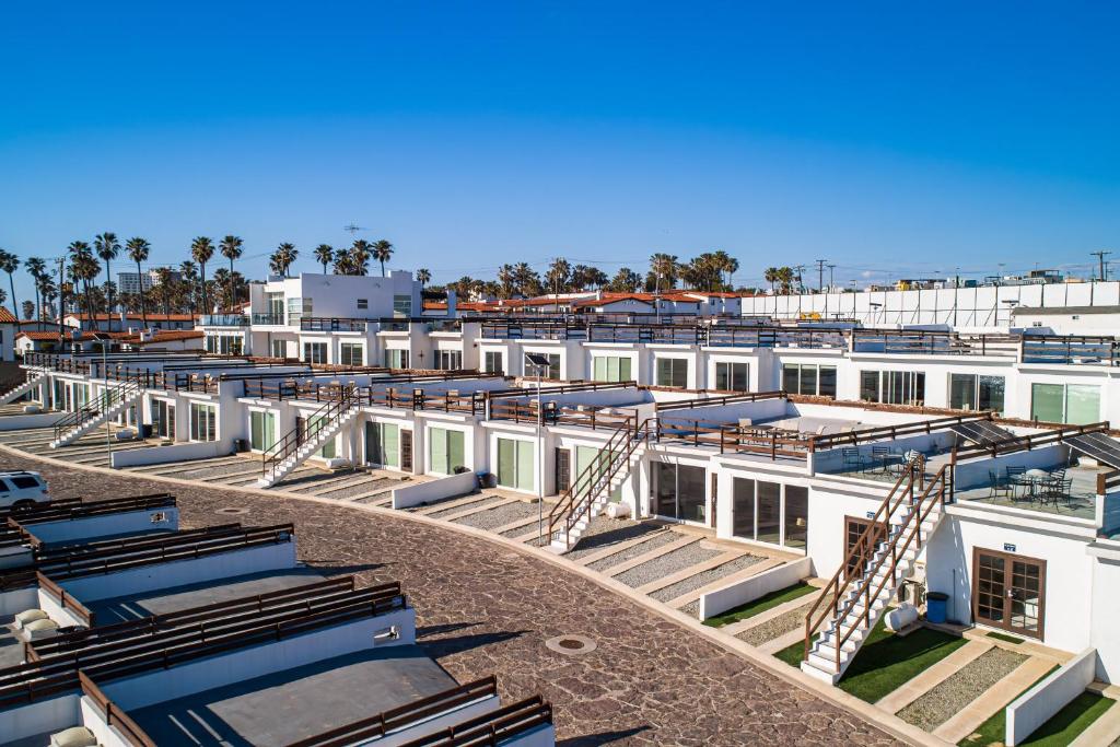 arial view of a building with lots of windows at Dog-Friendly Ocean-view Villa with Patio, Outdoor Pool, Streaming, partial AC in Rosarito