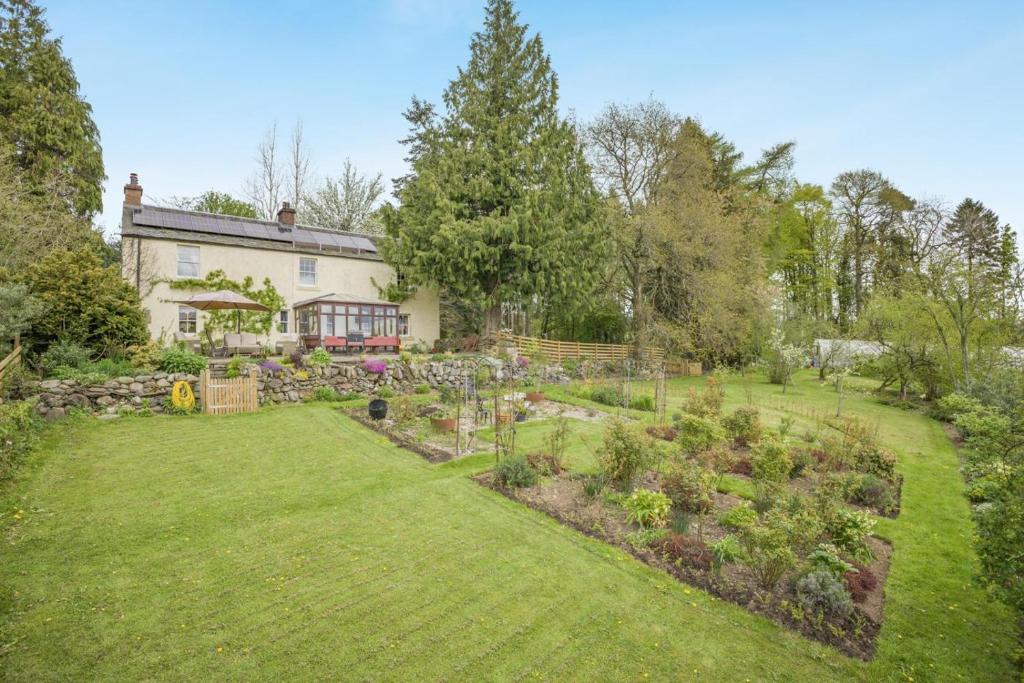 an aerial view of a garden in front of a house at 3 Bed in Lintrathen oc-w42585 in Bridgend of Lintrathen