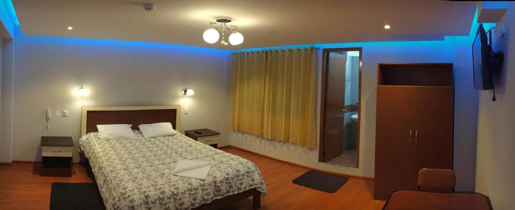 Postel nebo postele na pokoji v ubytování Casa Suite