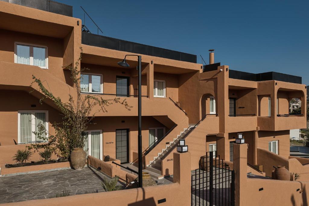an exterior view of a building at Papi Boutique Hotel in Vathí