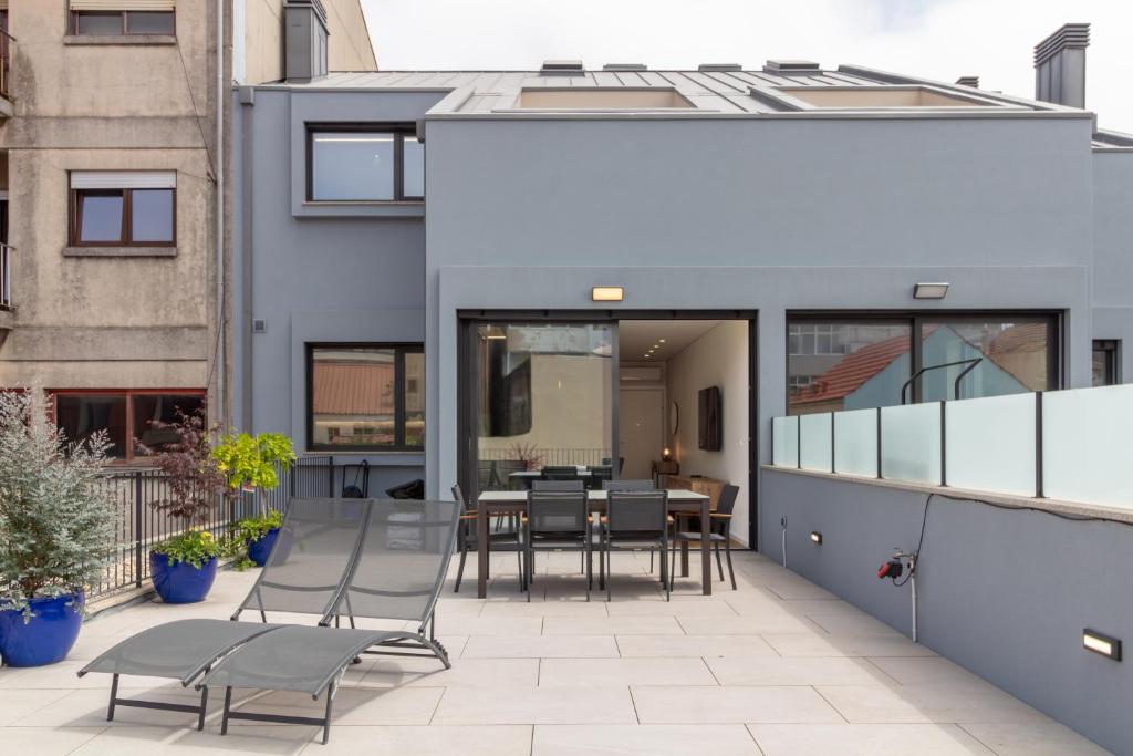 Coastal 3BR Duplex w Terrace by LovelyStay