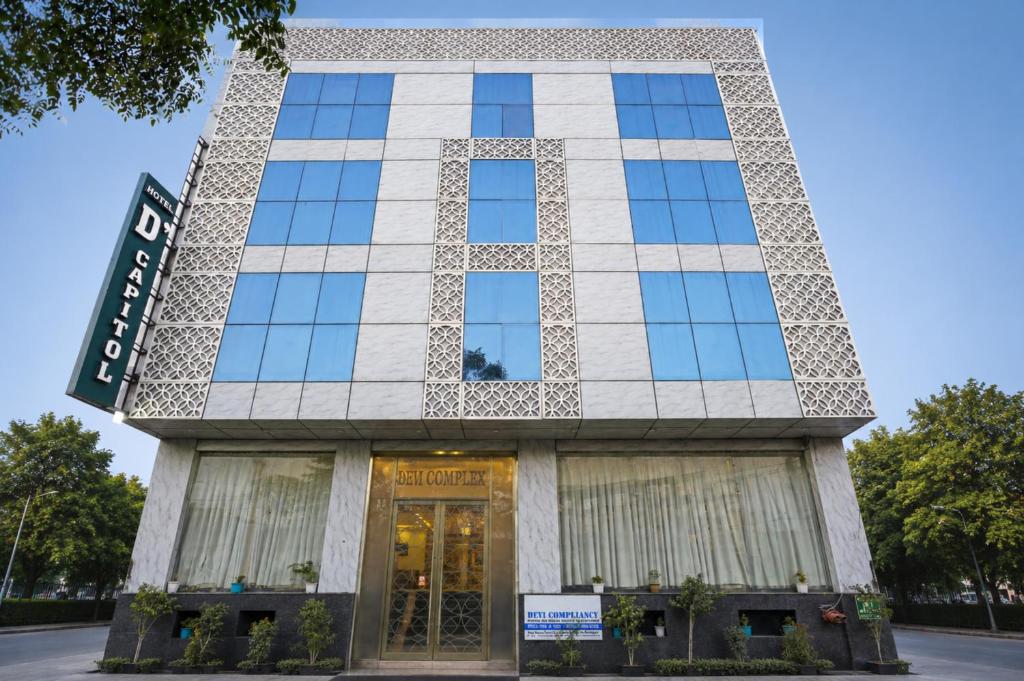a building with a sign in front of it at HOTEL D'CAPITOL - DELHI AiRPORT in New Delhi
