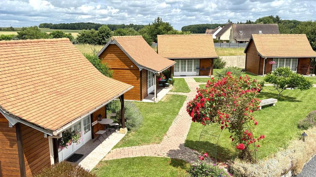 an aerial view of a row of cottages at Le Bois aux Cerfs in Bois-Jérôme-Saint-Ouen