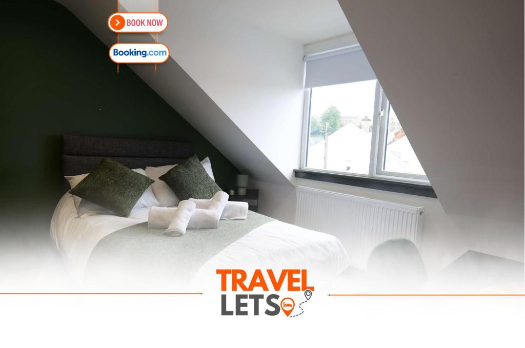 a bedroom with a white bed with pillows and a window at Private Double Rooms By Travel Lets Short Term Rental Agency Derry in Derry Londonderry
