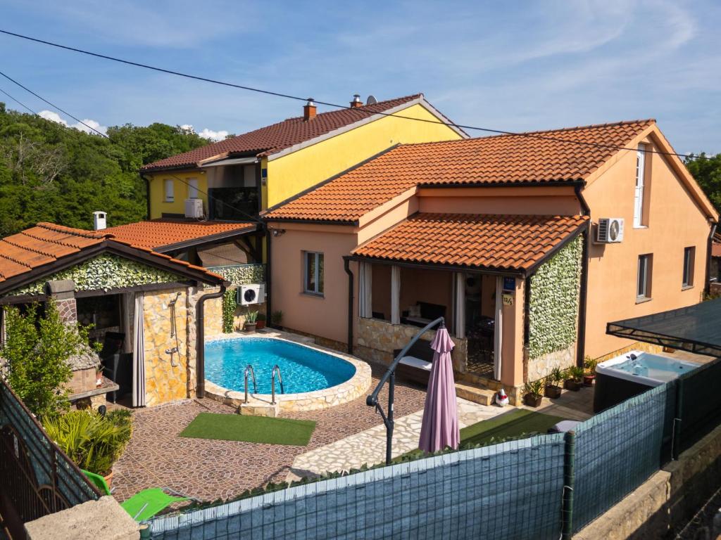 a house with a swimming pool in a backyard at Holiday Home Ana by Interhome in Šilo