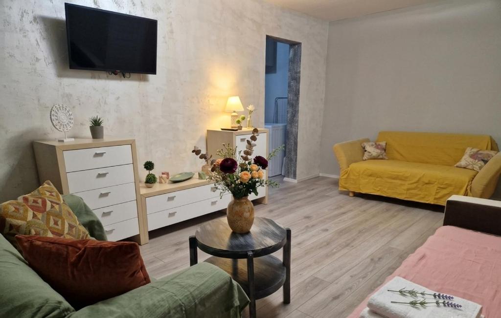 a living room with a couch and a table at Old City Cafe in Brăila
