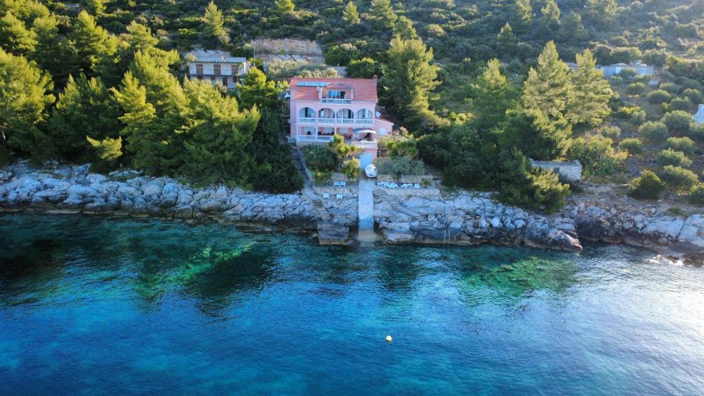 an aerial view of a house in the middle of a river at Apartments Maskovic Karbuni in Prizba