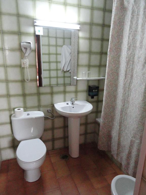 Koupelna v ubytování Hotel El Coloso
