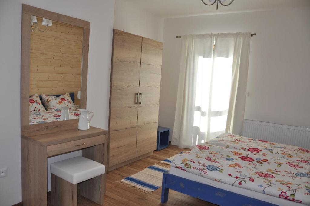 Postel nebo postele na pokoji v ubytování Vera Jasná