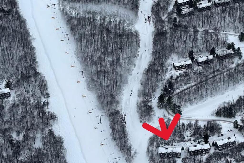 an aerial view of a road in the snow at Liftside Retreat in McHenry
