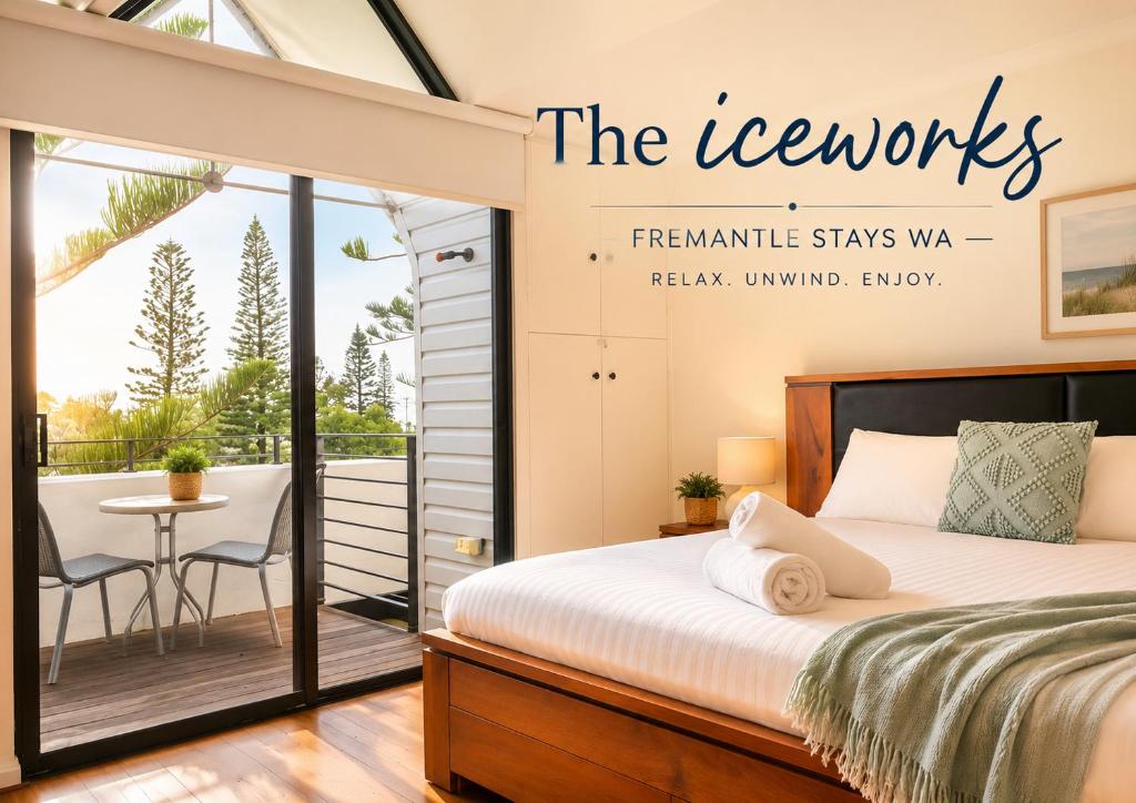a bedroom with a bed and a balcony at Esplanade Views Heart of Freo Family Stay in Fremantle