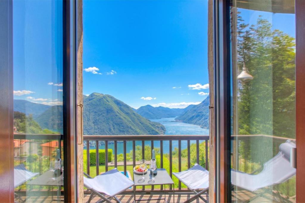 Angelina: Panoramic Lake View House on Monte Brè | Terrace & Balcony - Happy Rentals