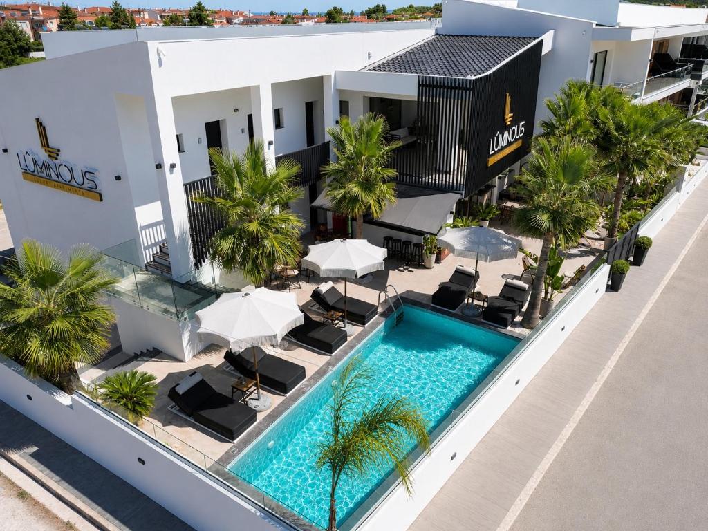 an aerial view of a hotel with a swimming pool at Luminous luxury living in Kallithea Halkidikis