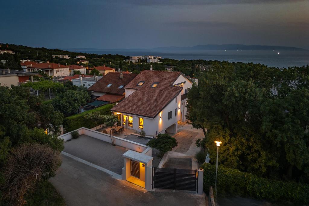 an overhead view of a white house with a roof at Desamani 975 in Kostrena