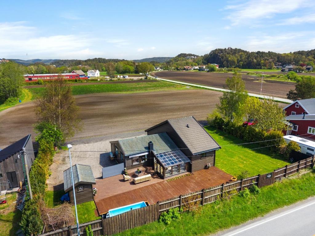 an aerial view of a house with a solarium at Beach cottage in Søgne in Kristiansand