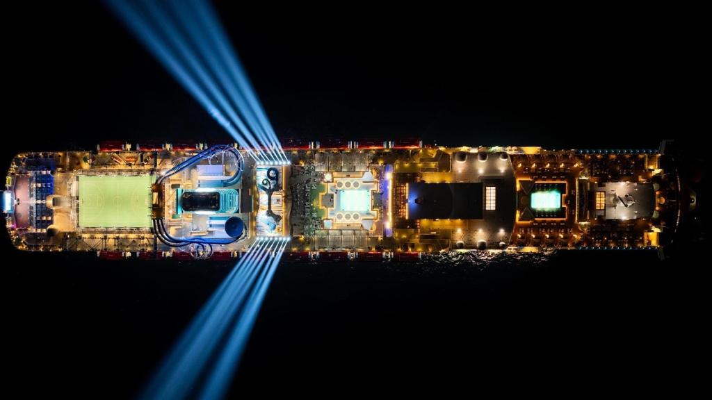 a view of a city at night with blue lights at GYTf in Cairo