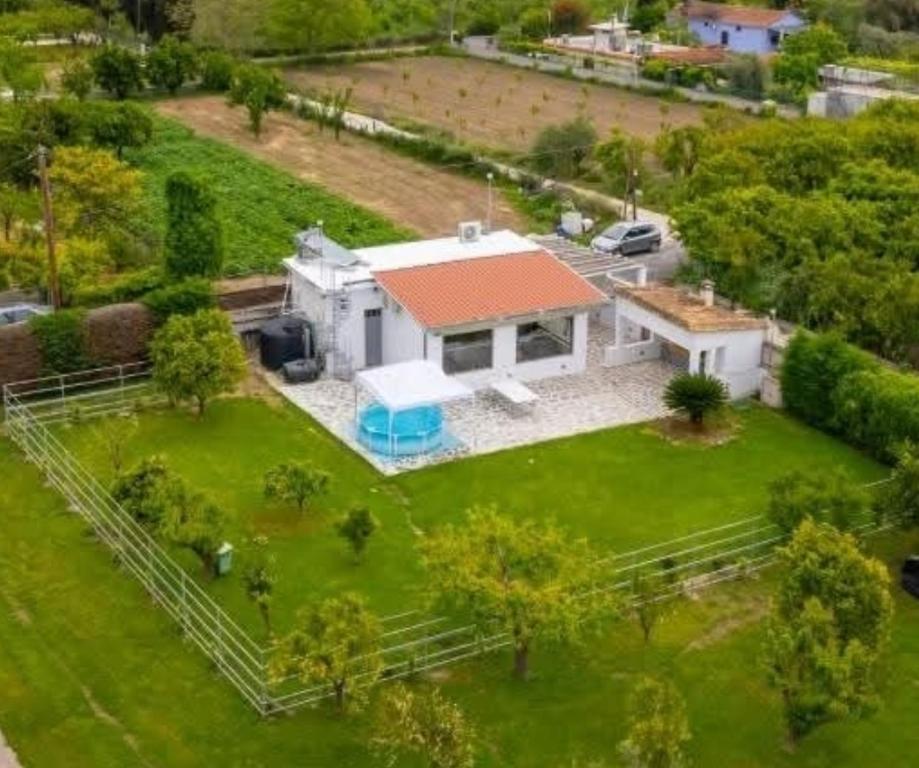 an aerial view of a house with a yard at Green Galini Villa Pelion - the small unit in Platanidia