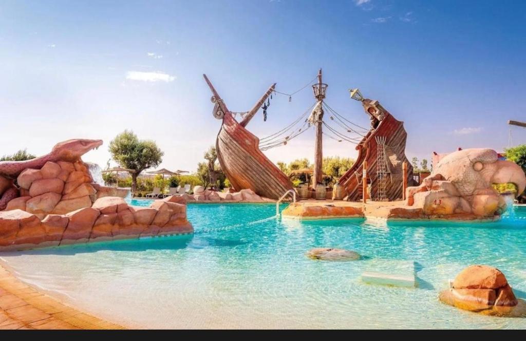 a water slide in a theme park at Appartement Au vizir avec Accès au Parc de loisirs in Dar Caïd Layadi